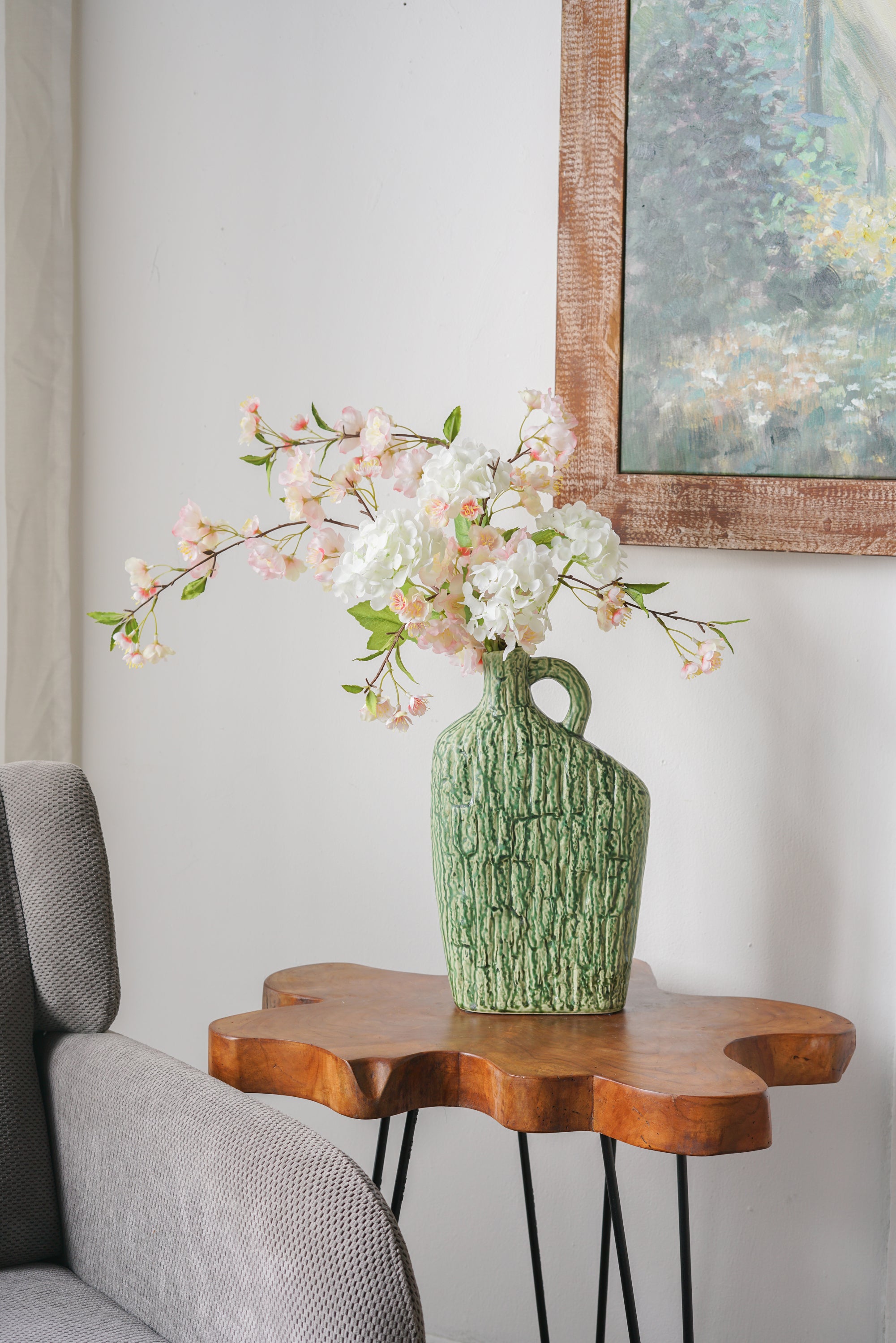 8.5x3.9x13.8' Asymmetrical Green Ceramic Vase with Handle and Organic Texture
